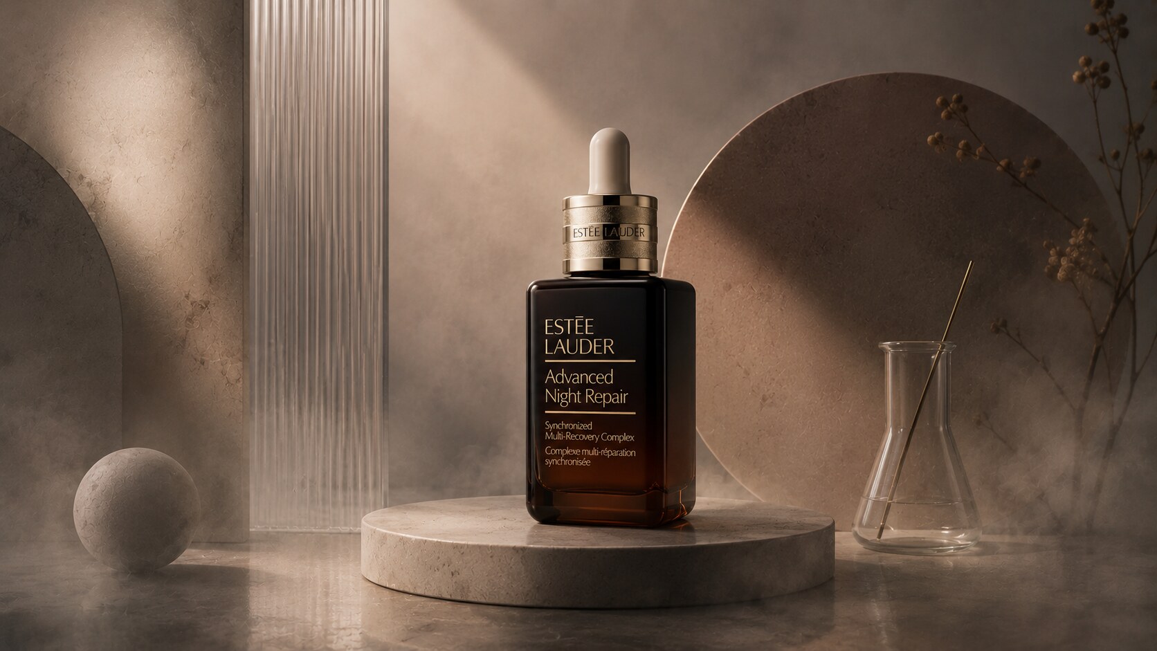 Estée Lauder Advanced Night Repair shown in its iconic little brown bottle with pipette.