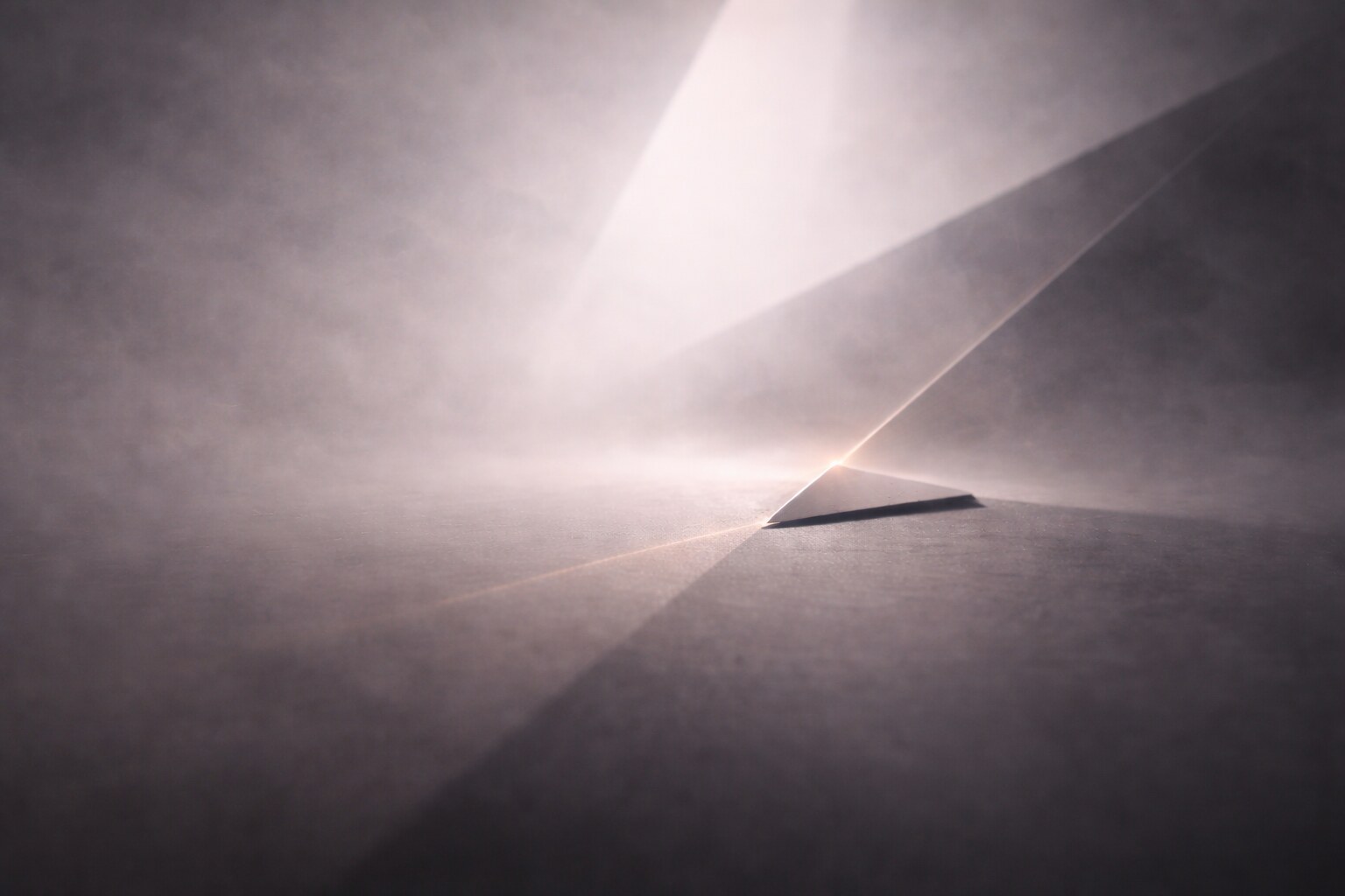 Prada brand design, industrial elegance, and triangle identity.